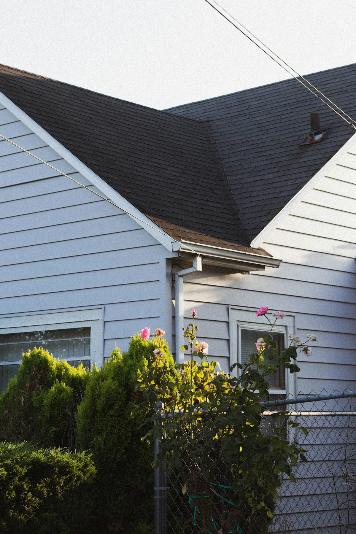 Close view of a residential roof valley where two roof planes meet. TODO: replace with a Bill Ragan repair photo.